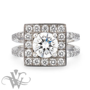 ROUND DIAMOND SET IN A SQUARE WITH PAVE DIAMONDS AND DIAMONDS DOWN THE BAND #2665